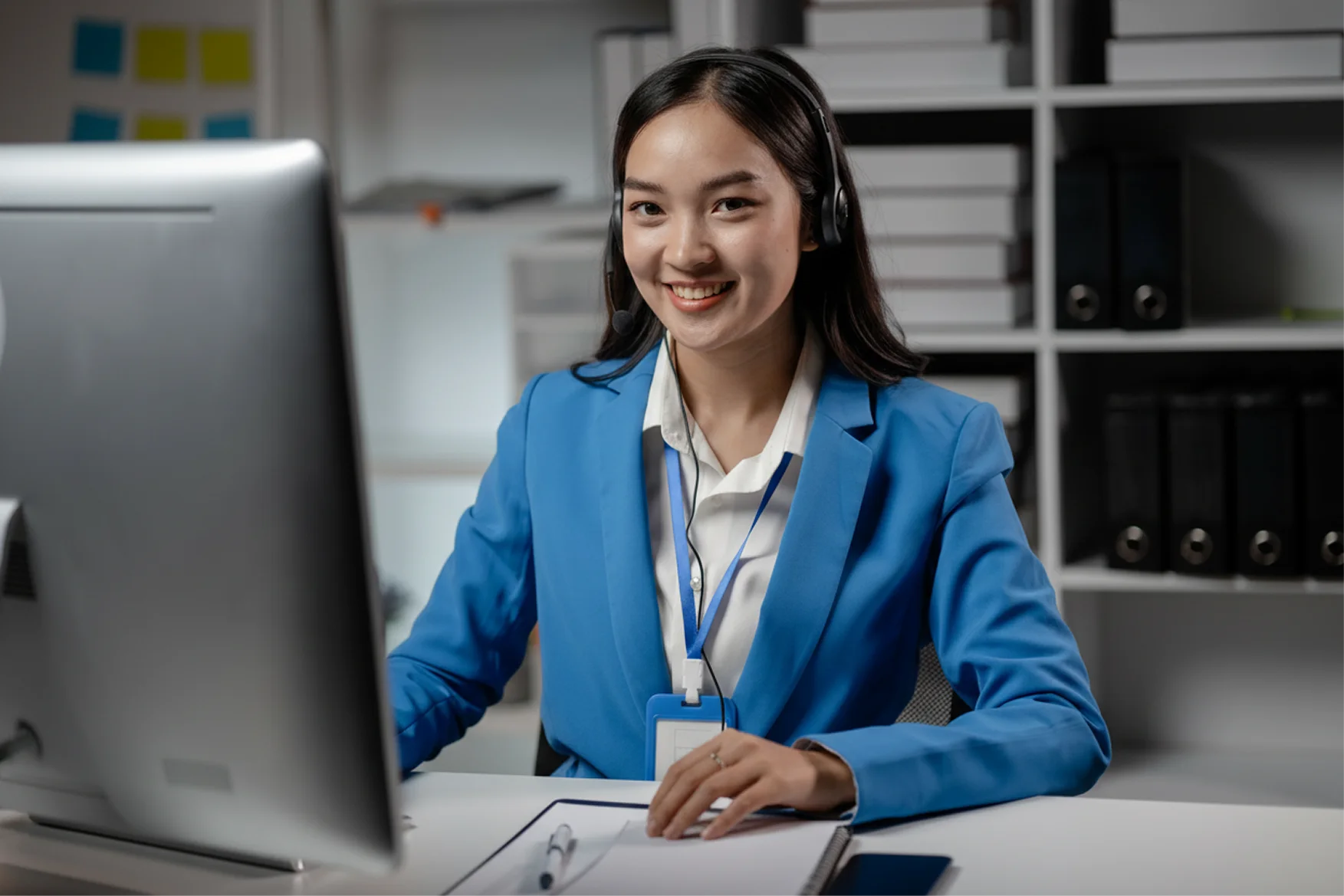 Girl sitting in front of computer